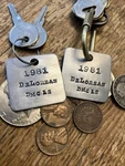 (2) 1981 Delorean Dmc 12 Aluminum Key Pair Of Chain Fobs New. Price: $29.95.