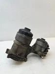 1844576C92 Engine Oil And Fuel Filter Housing Ford F350 Super Duty 6.0L R105 Used. Price: $89.99.